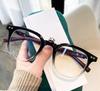 Nuevas gafas TR90 m con montura redonda y diseño de uñas, estilo retro, con patas de madera y antiluz azul, a juego para hombres y mujeres.