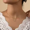 Al por mayor transfronterizo europeo y americano moda temperamento simple 2023 nuevo retro pequeño collar de sol cadena de clavícula joyería para mujer