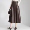 Elegante falda de cuero plisada y fluida para mujer, nueva colección otoño/invierno 2026, falda de línea A de longitud media