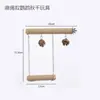 Columpio percha para loro con cuerda de cáñamo enrollada alrededor de un adorno de piña, un juguete masticable y que alivia el aburrimiento para aves en la jaula, adecuado para periquitos y agapornis