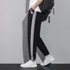 Pantalones deportivos para hombre de cintura elástica para primavera y otoño para el trabajo holgados diarios largos rectos tres rayas pantalones casuales hombre