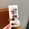 Tecido cor de café desenho animado presilha de cabelo infantil laço xadrez pérola presilha de tecido totalmente revestida presilha para franja de bebê sem danificar