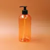 Botella de plástico dorada naranja de 500 ml para desinfectante de manos Botella con bomba de loción Botella Boston para champú de baño