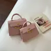 Bolso de Mujer 2026 Otoño Nuevo Estilo Hebilla Moda Bolso de Mujer Retro Bolso Cuadrado Pequeño Hombro Cruzado Bolso Simple de Mujer