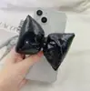 Clip trasero para teléfono móvil correa cruzada para niñas clip de cordón con lazo clip trasero japonés y coreano cordón transparente de dibujos animados para teléfono móvil