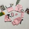 Para comercio exterior en Europa y Estados Unidos conjunto de pijama de siete piezas para niñas manga larga tirante de seda rayado ropa de casa al por mayor