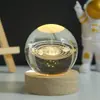Base de madera luminosa al por mayor transfronteriza bola de cristal tallada luz de noche decoración Sistema solar galáctico bola de cristal