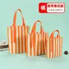 Bolsa de lona a rayas de Amazon en stock, bolsa de lona para ventas transfronterizas, bolsa de lona colorida para fines publicitarios y de regalo