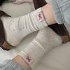 Otoño e invierno estilo académico coreano calcetines de algodón nuevo color punto hilo lazo tela calcetines tubo estándar calcetines de felpa niños