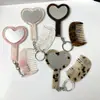 Nuevo Set de Espejo y Peine en Forma de Corazón, Accesorio de Bolso Simple y Versátil, Llavero de Peine con Mango Portátil