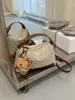Bolsa pequena versátil retrô de comércio exterior para mulheres, nova coleção outono/inverno 2026, bolsa de alta qualidade com estampa de leopardo, bolsa de ombro e bolsa transversal da moda