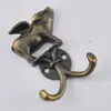 Gancho vintage con forma de jirafa, gancho de aleación de zinc de estilo europeo, gancho decorativo creativo para colgar en la pared o en la puerta, con borde cruzado.