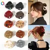 O novo prendedor de cabelo pequeno em formato de abóbora da Qiyue é um acessório de cabelo simples e estiloso para mulheres, adequado para penteados presos na nuca, e está disponível para atacado.