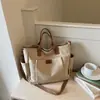 Bolsa de lona de gran capacidad para mujer, nuevo modelo de verano 2026, adecuada para estudiantes universitarios, para ir al trabajo, bolsa de mano, bolso de mano, bolso cruzado