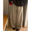 Calça Jogger de Lã Estilo Casual 2025 Novo Estilo de Inverno Quente e Emagrecedora Redutora de Idade Casual Feminina Solta Calça Jogger