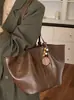 Bolsa de mano grande transfronteriza para mujer, nueva moda otoño 2026, bolso de hombro, elegante y versátil para el trabajo y los desplazamientos