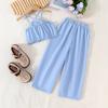 Traje de verano nuevo con temperamento para niñas de Europa y Estados Unidos, conjunto de dos piezas para niños con top de tirantes de flores tridimensionales y pantalones