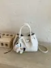 Bolso de Mano Tejido a Mano de Nicho Coreano para Mujer 2026 Nuevo Estilo Primavera Bolso Tote Cesta con Acabado de Alta Gama, Diseño Acolchado de un Solo Hombro
