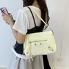 Bolso de mujer de alta gama, nuevo para la primavera de 2026, bolso de axila para el trabajo, bolso de hombro cruzado con diseño de nicho, moderno y simple