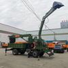 Máquina todo en uno de tracción en las cuatro ruedas hecha a sí misma para excavar, levantar, empujar tierra, grúa móvil con ruedas y vehículo de construcción excavadora