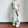 Jeans retro americanos elásticos plisados micro-bota, estilo ro de calle, pantalones rectos holgados de nicho de longitud de piso para hombres y mujeres
