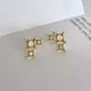 Brincos de agulha de prata com estrela de quatro pontas, de luxo leve e alta qualidade, para mulheres, brincos de zircônia requintados e modernos, de nicho, com design de luxo leve