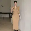 Vestido de Punto Estilo Coreano Otoño Invierno 2026 Cuello Polo para Mujer de un Solo Botón Ajustado al Cuerpo Elegante de Longitud Media