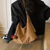 Bolsa Tote de Camurça Grande Capacidade Versão Coreana Ins Moda Outono 2025 Tendência Versátil Bolsa de Braço de Alto Padrão