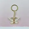 Llavero Popular Transfronterizo de Mariposa Colorida Degradada Colgante Pequeño Creativo Estilo Europeo y Americano Accesorio Decorativo para Mochila Funda de Auriculares