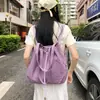 Mochila transfronteriza 2026 con nuevo cierre de cordón, bolsa de mano de gran capacidad, bolso de hombro casual de alta gama para mujer