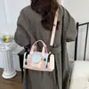 2026 Nuevo Bolso Redondo Cilíndrico de Bloques de Color de Moda Bolso de Mano Hombro Cruzado Bidireccional Multifuncional Casual Versátil para el Trabajo Bolso de Mujer Bolso de Mamá