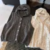 Colete de tricô com capuz de abotoamento simples para mulheres, novo outono 2026 estilo coreano, solto, casual, versátil, jaqueta suéter sem mangas