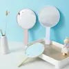 Espejo de maquillaje de mano portátil redondo HD para chica estudiante espejo de maquillaje de bolso espejo pequeño fabricantes al por mayor