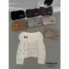 Apenas Um VI+ Outono Estilo Francês Preguiçoso Jacquard Vazado Ombro a Ombro Manga Longa Suéter de Tricô 98862 (com saco)