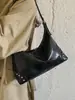 Bolso Estilo Chica Picante Retro para Mujer 2026 Otoño Nueva Llegada Nicho Remache Bolso de Hombro Cruzado Viaje Casual Bolso Dumpling