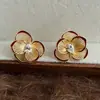 Aretes de Oro de 18K Estilo Ins Camelia Calada Coreana Suave Elegantes Versátiles Retro Franceses Nicho Año Nuevo