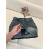 Saia Jeans Estilo Retrô Hot Girl Feminina 2026 Primavera Verão Nostálgica Evasê Cintura Alta Elástica Anti-Exposição Forrada Curta