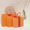 Sacola de Presente Personalizada Laminada Não Tecida para Loja de Roupas Sacola de Compras Sacola com Logo Impermeável Ecológica Bolsa de Mão