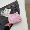 2024 nova bolsa feminina de bolso pequena dourada de inverno bolsa pequena popular este ano bolsa de ombro transversal feminina bolsa de balde com textura