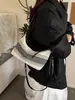 Otoño 2026 Nuevo Retro Simple Bolso Pequeño de Hombro para el Trabajo Bolso de Mujer con Sensación Relajada Bolso Cruzado Casual Bolso de Mujer al por Mayor