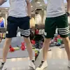 Pantalones cortos de verano de seda helada finos de secado rápido de cuatro barras para hombre estilo coreano modernos casuales pantalones de playa shorts deportivos para jóvenes