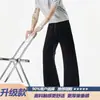 Calça masculina azul de perna larga, corte solto, com estampa de escamas de cobra, marca tendência CL Klein ean2026, levemente flare, verão