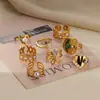 Anillo de acero inoxidable con perla sintética estilo INS retro exagerado corazón geométrico anillo de titanio mariposa