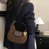 Bolso de media luna minimalista de moda transfronterizo, bolso redondo pequeño versátil elegante de alta gama, bolso cruzado tipo dumpling moderno personalizado de lujo ligero