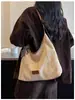 Bolso grande de mujer retro, nuevo bolso de moda de ante tipo albóndiga para el otoño de 2026, bolso cruzado informal para el día a día