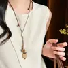 Nova corrente de pescoço com pingente de bolota de palha estilo Zen chinês para mulheres, corrente de clavícula estilo étnico de verão, acessório longo estilo nicho de férias