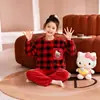 Conjunto de pijama de franela para niños de otoño e invierno, cálido, para niñas y niños, engrosado, con estampados de dibujos animados, cuello redondo y hecho de vellón de coral para un uso cómodo en casa.