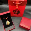 Jade blanco con incrustaciones de oro colgante Buda sonriente de jade blanco pie de jade blanco colgante Buda Maitreya de oro para hombres y mujeres parejas este año colgante al por mayor