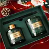 Los juegos de regalo de aromaterapia navideña admiten juegos de velas personalizados en botella de vidrio y se suministran desde fábricas de origen para la compra transfronteriza.