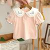 Camiseta de Verano para Niñas Bebé Elegante Infantil Personalizada Moderna Marca Coreana Flor Bordada Lar Manga Burbuja Camisa de Muñeca